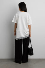 ASYMMETRICAL TOP WITH LACE TRIM
