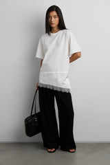 ASYMMETRICAL TOP WITH LACE TRIM